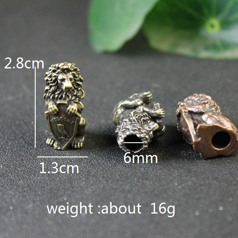 Lion King Holding Owl Shield F - огляд і ціна Paracord Survival Bracelet
