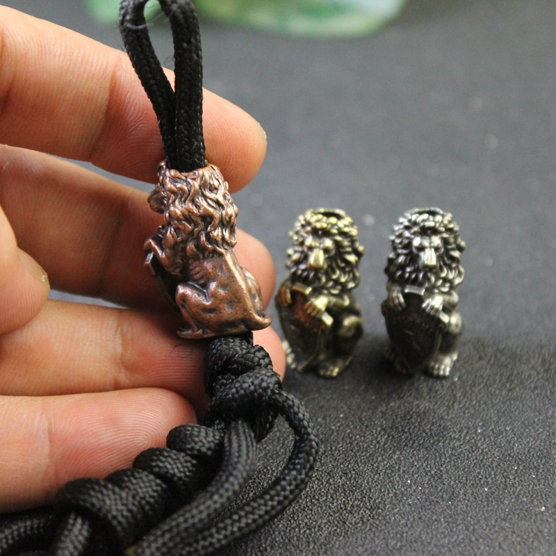 Lion King Holding Owl Shield F - огляд і ціна Paracord Survival Bracelet